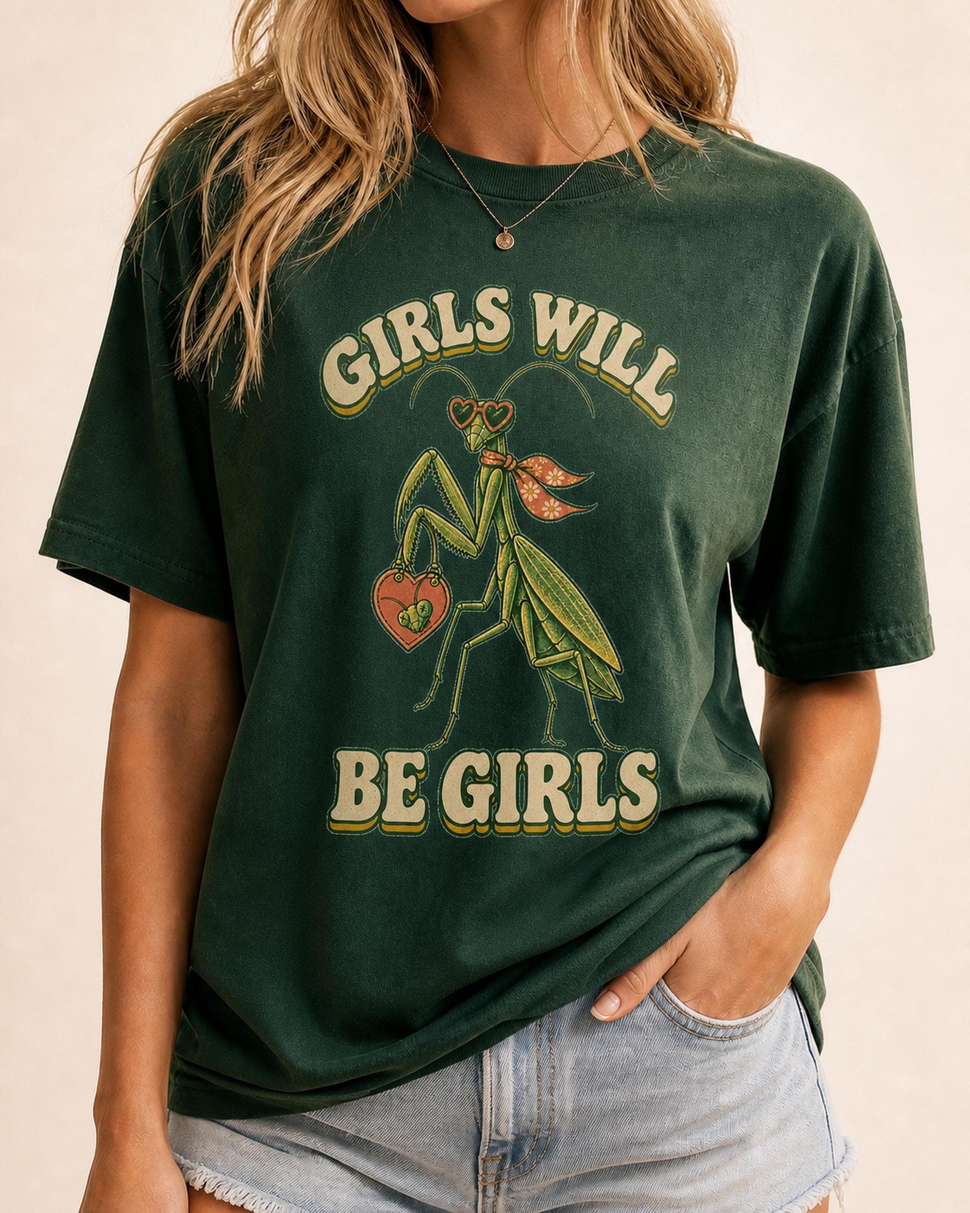 Retro Girls Will Be Girls praying mantis design printed at a natural scale on a cream T-shirt.
